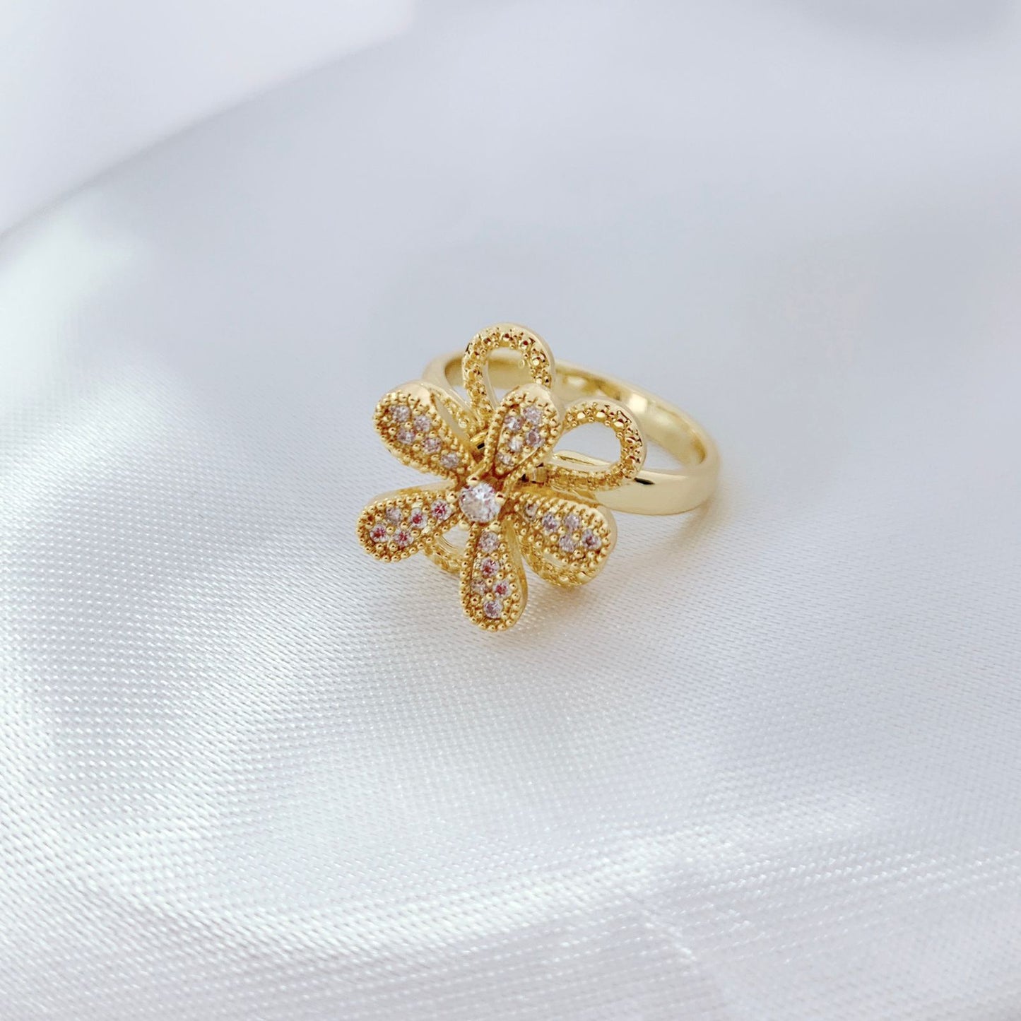 Anillo giratorio flor