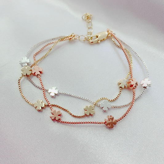 Pulsera trébol tres oros